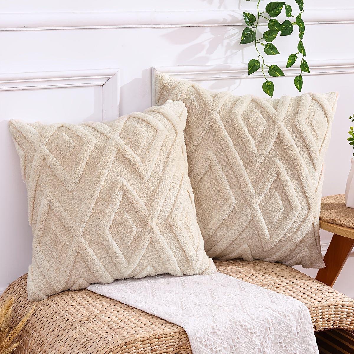 Pair of plush throw pillow covers in contemporary geometric pattern, hand wash only, 100% polyester zipper closure, beige wavy design for living room décor.