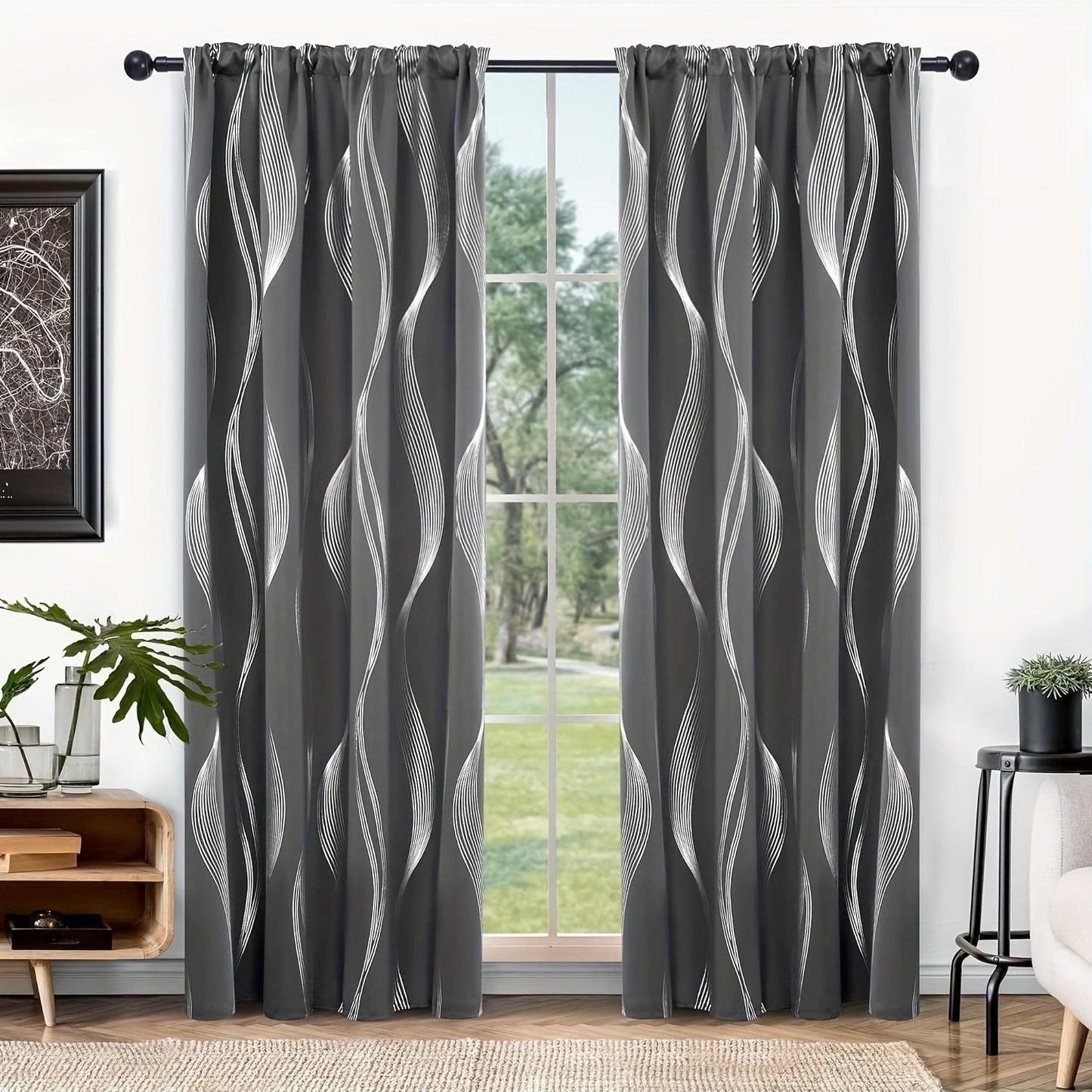 Two pieces of contemporary blackout curtains made from high-quality woven polyester, featuring a grommet top design for easy hanging. These room darkening drapes are machine washable and showcase a fantasy stripe pattern with eyelet detailing. Suitable