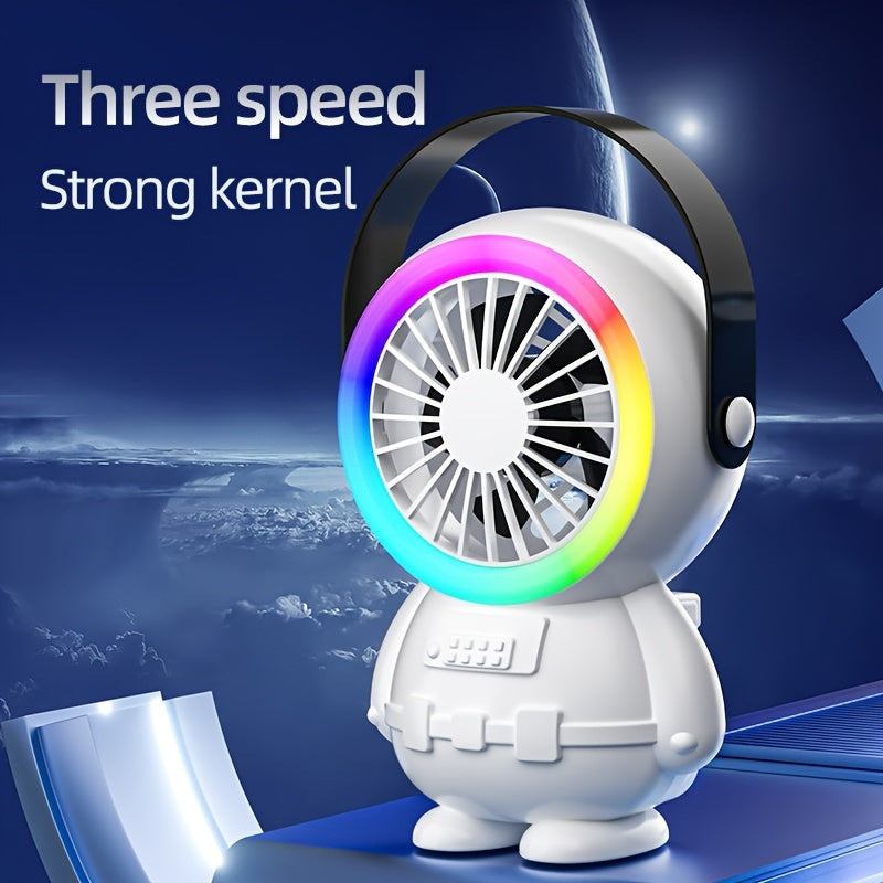 A fashionable astronaut-themed USB fan that is rechargeable and portable, featuring three adjustable speed settings. Perfect for both indoor and outdoor use.