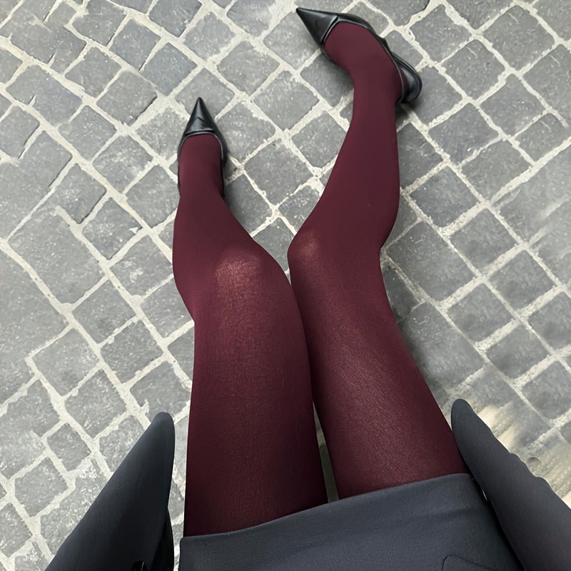 Burgundy tights for women made of polyamide knit fabric with elastane for comfort stretch. 1 pair of opaque tights for autumn, gentle wash recommended.