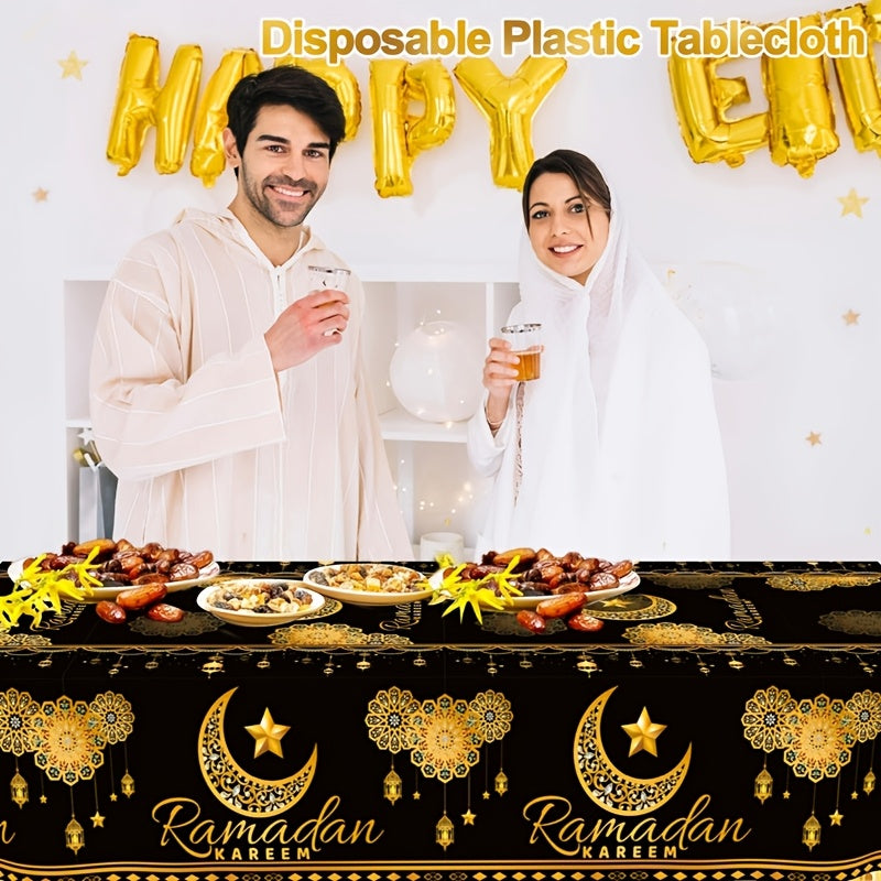 Ramadan-themed disposable plastic tablecloth with black and golden moon, lantern, and star design, sized 130x220cm. Perfect for Eid Al-Fitr & Eid Al-Adha celebrations.