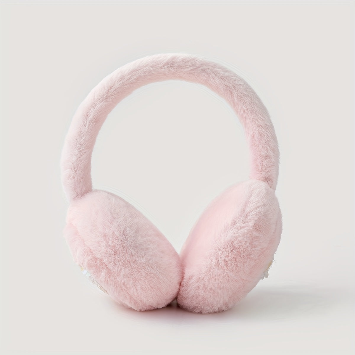 Keep cozy and stylish with these adorable Pink Heart Plush Earmuffs - perfect for daily use during the cold winter months. Made with thick materials, they provide excellent warmth and protection for your ears during outdoor activities.