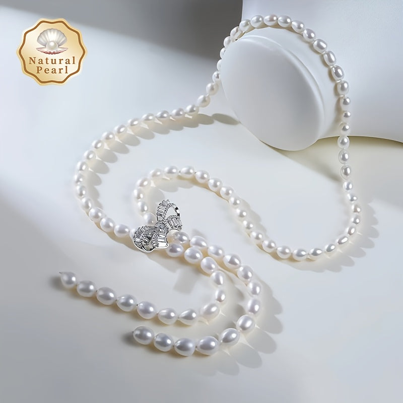 MUFAN Elegant Luxury Pearl Necklace features Natural Freshwater Pearls 6-9mm with Synthetic Zirconia Inlay. It has a Bowknot Tassel Design and is free from plating. This necklace is perfect for daily wear and gifting, as it is June Birthstone Compatible