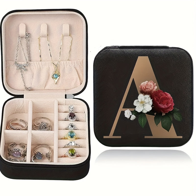 Floral initial jewelry organizer box with compact design, soft velvet lining, durable zipper, and lightweight, ideal for jewelry organization and travel.