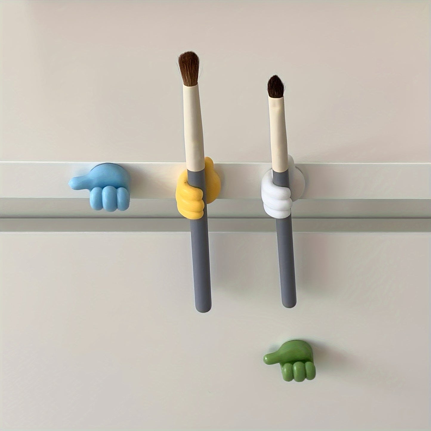 5 Thumb Pattern Cable Organizers with Adhesive Hooks - Ideal for organizing kitchen appliances and bedroom accessories without drilling.