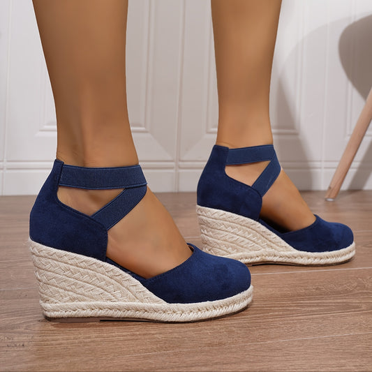 Women's slip-on wedge sandals with elastic cross straps, round toe, and non-slip sole.