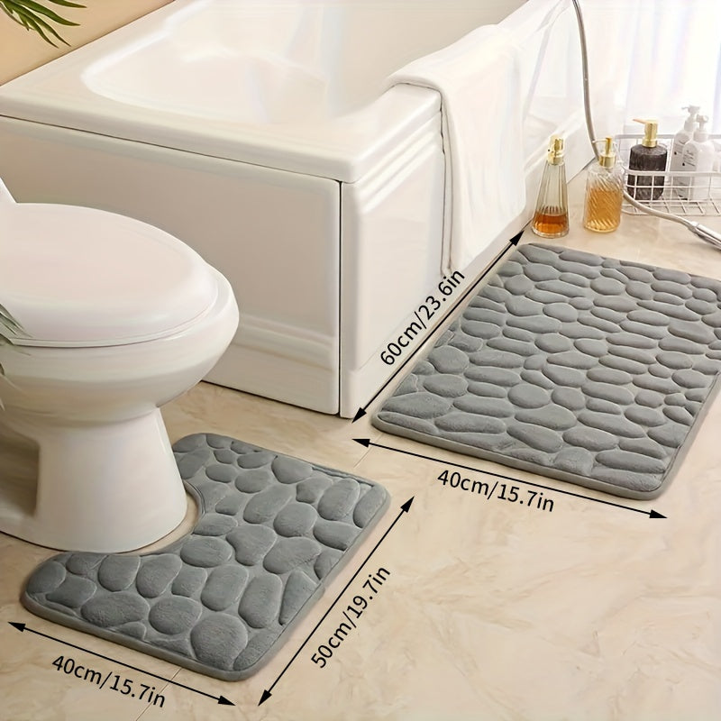 Two pieces of ultra-soft bath mats with stone embossing, 25D thick sponge material. Non-slip and highly absorbent, suitable for use in the shower, kitchen, laundry room, and as bedroom decor.