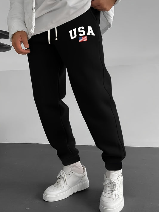 Men's casual knit sweatpants with USA flag print, elastic waist and drawstring for outdoor activities.