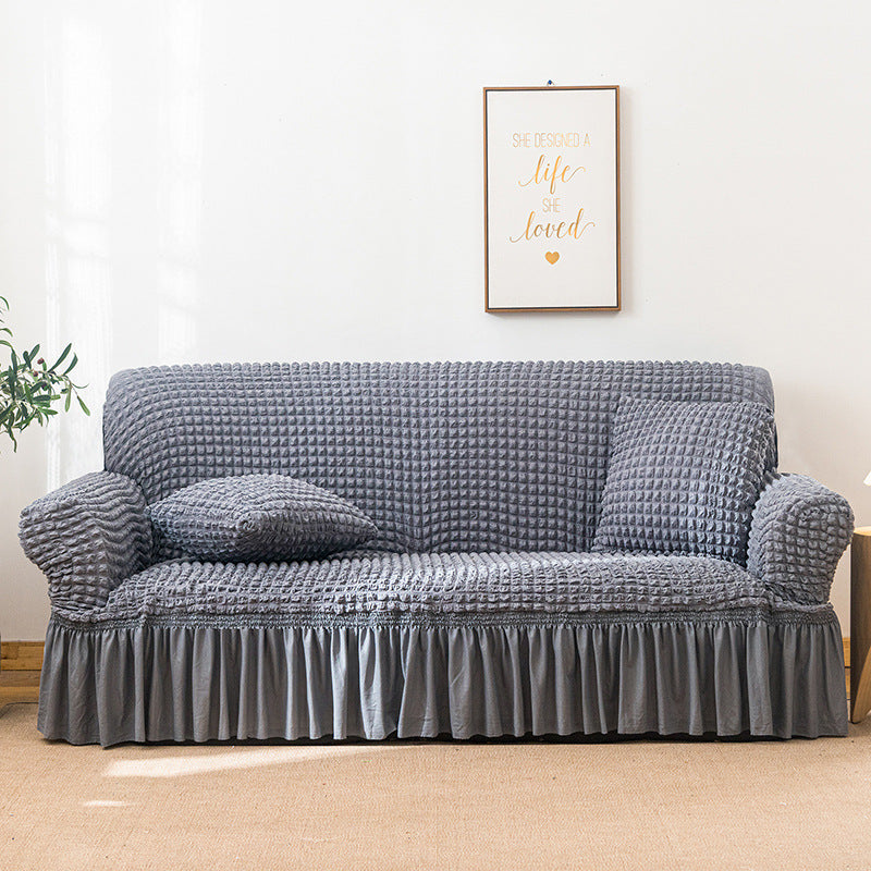 Stretch sofa slipcover with skirt, washable and durable, universal fit.