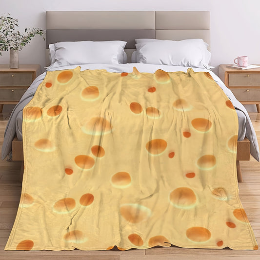 One piece of a Cheese Print Flannel Blanket in Classic Yellow color. This fun food themed blanket is comfortable and perfect for all seasons. It can be used for various purposes at home, on the bed, sofa, or while camping. The blanket features a digital