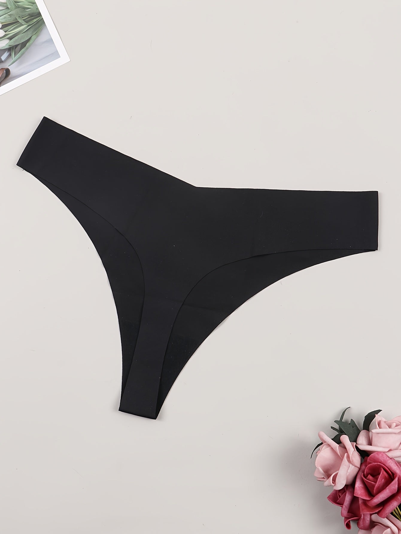 1 piece of women's glow in the dark thong panties made of comfortable polyamide knit fabric.