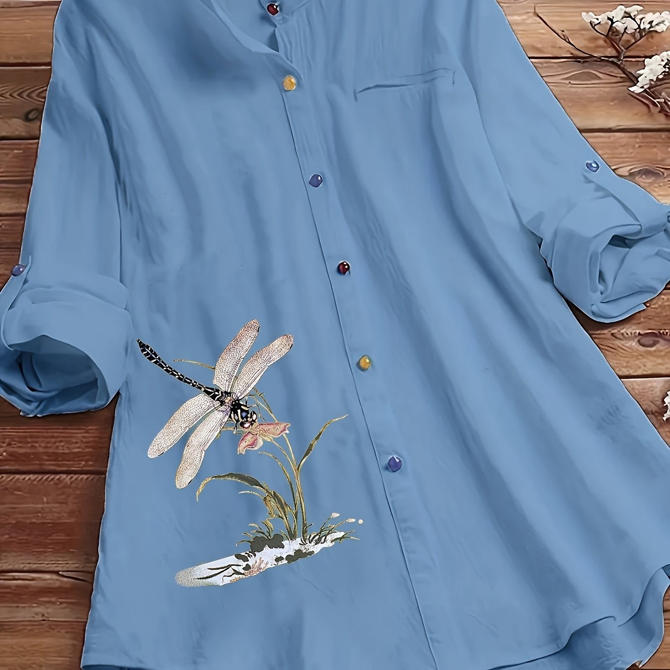 Dragonfly print blouse with button front and long sleeves for plus size women.