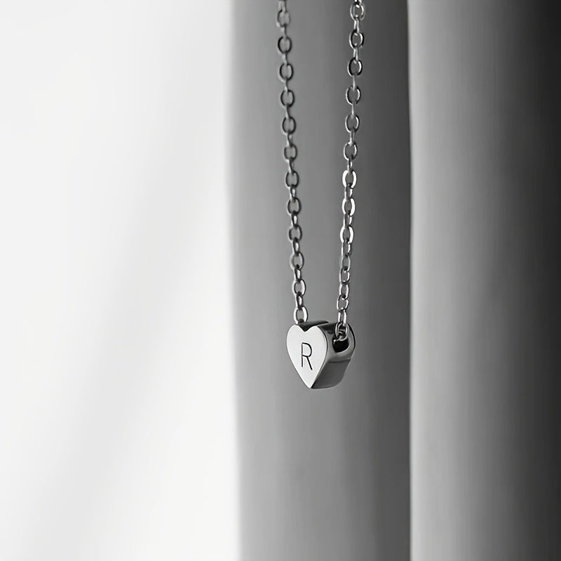 Stylish and chic, this Heart Initial Necklace is custom-made for girls. Crafted from durable stainless steel, it is perfect for any occasion, whether it be a casual day out or a fancy party. This makes a thoughtful gift for both friends and mothers