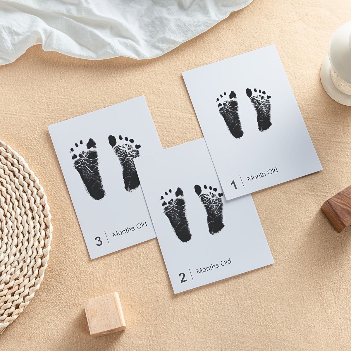 Footprint & Handprint Milestone Kit with 14 Pieces, from AI BEI PARENT CO. Includes Safe Non-Toxic Ink Pads, Print Paper Set for Memory Keepsake Craft. Comes with 14 Ink Pads and 14 Papers, suitable for babies up to 12 months old.