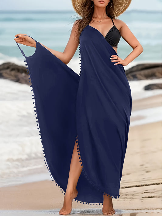 Maxi beach dress with pom-pom decor, backless V neck, and wrap hem. Perfect for swimwear and clothing for women.