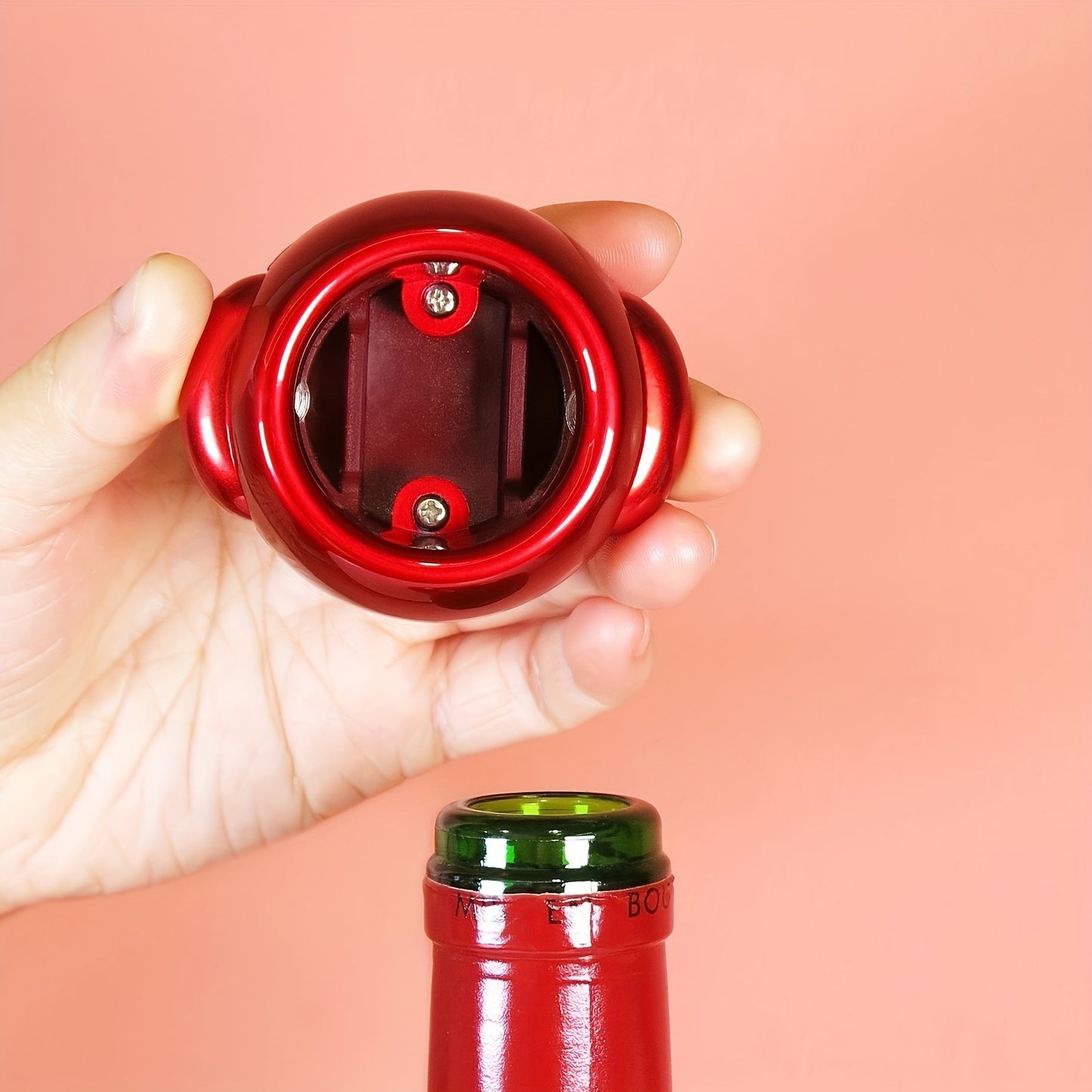 Red ABS wine bottle opener featuring a paper cutter, manual lever design. This festive kitchen tool is perfect for celebrating Christmas, Thanksgiving, Valentine's Day, Easter, and Halloween.