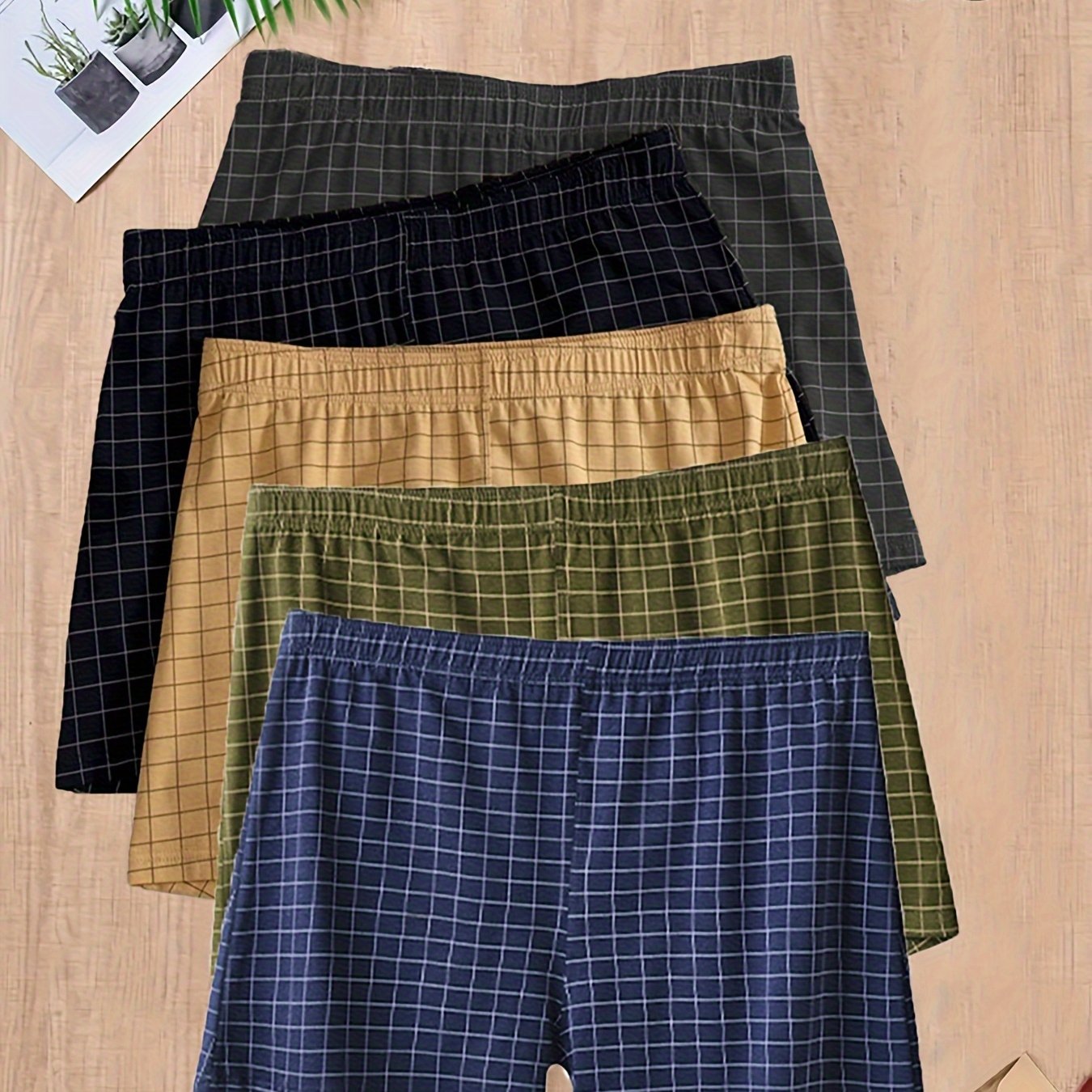 5 pieces of men's cotton plaid boxer briefs with breathable, comfort fit and elastic waistband.