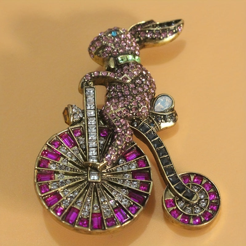 Add a touch of nostalgia with this adorable 1PC Retro Bunny Bicycle Shaped Brooch, embellished with rhinestones. A perfect accessory for women to add to their dress, coat, sweater, or corsage.