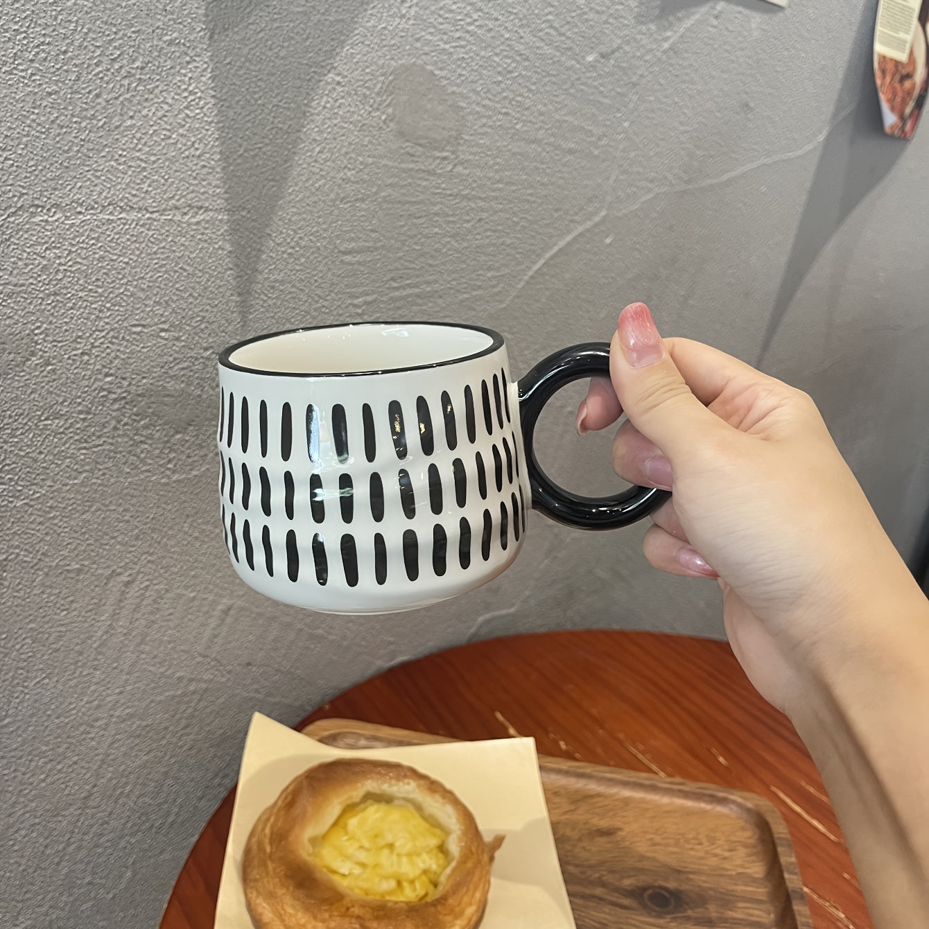 Stylish black and white checkered ceramic coffee mug - Ideal for home or restaurant use.