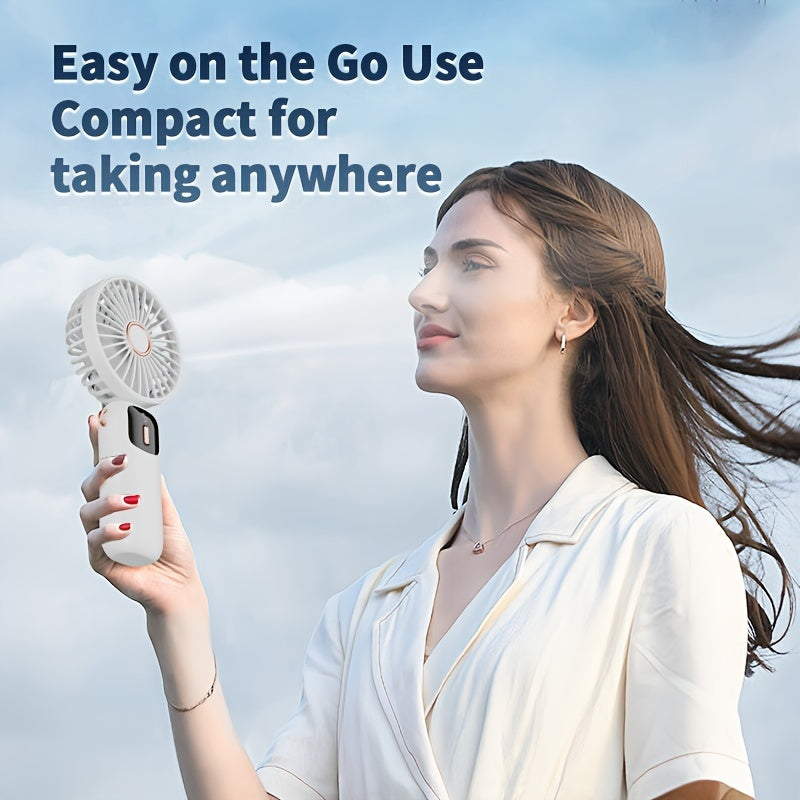 Stay cool on the go with the jkuoo Portable Mini Fan featuring an LED display. This USB rechargeable fan is both quiet and powerful, making it perfect for any situation. The foldable design in sleek light gray makes it ideal for students, office workers