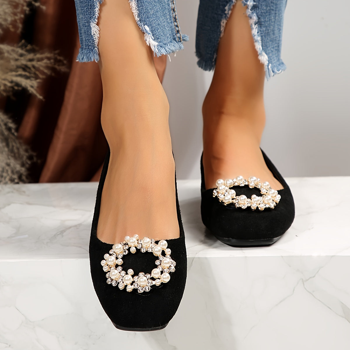 Women's black flat shoes with embellishments and comfortable fabric upper. Suitable for casual or formal occasions. Versatile and durable rubber sole.