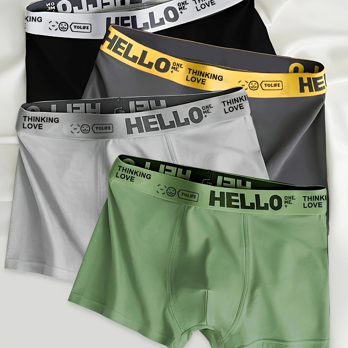 4 Men's Boxer Briefs: Polyester/Spandex blend, mid-waist, solid color, breathable knit fabric