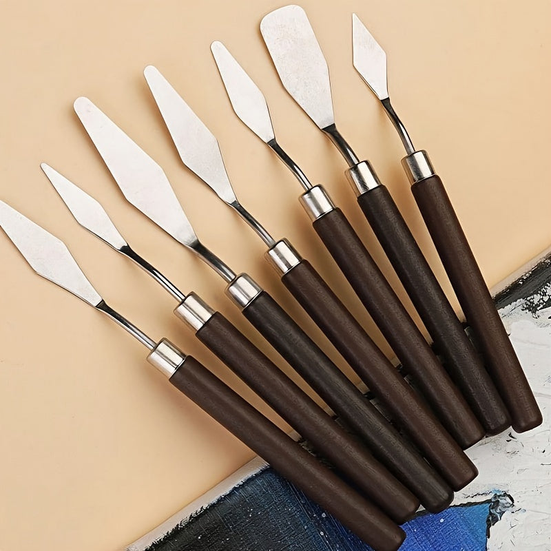 Set of stainless steel palette knives for oil painting, available in various sizes and shapes.