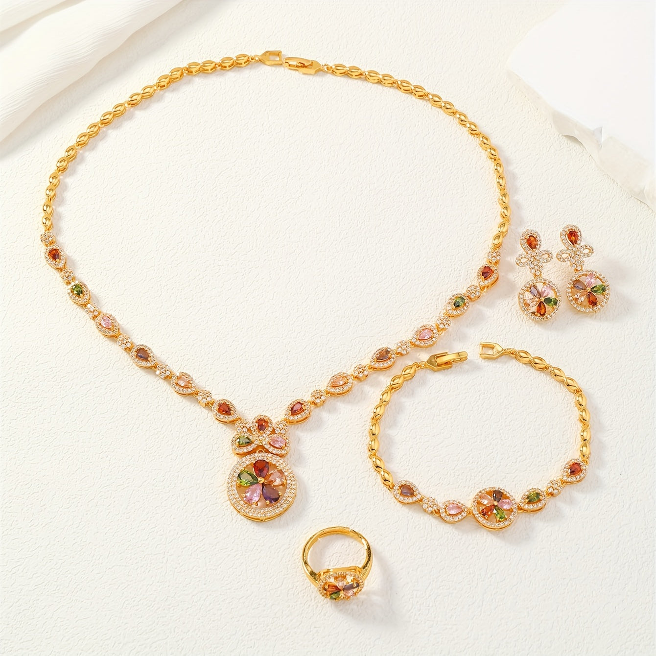 Elegant Women's 4-Piece Jewelry Set with Vintage Luxury Vibe - Featuring 24K Gold Plated Copper and Synthetic Zirconia Stones in a Timeless Circle Motif. Includes Necklace, Bracelet, Ring, and Earrings - Perfect for Weddings, Banquets, or as a Thoughtful