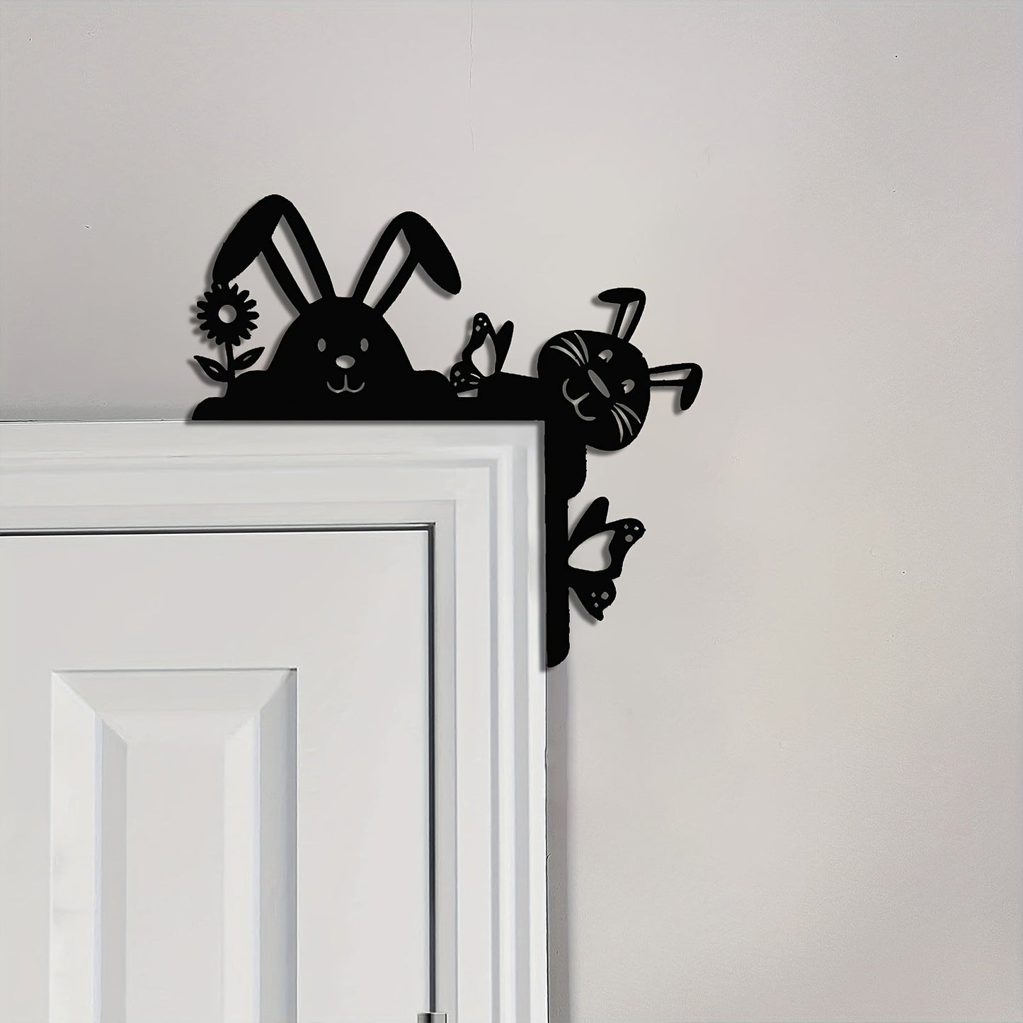 Add a festive touch to your home with this unique Metal Easter Bunny Logo Decoration that hangs elegantly in the door corner. Crafted from black iron, this charming piece is perfect for adding a festive Easter vibe to any space.