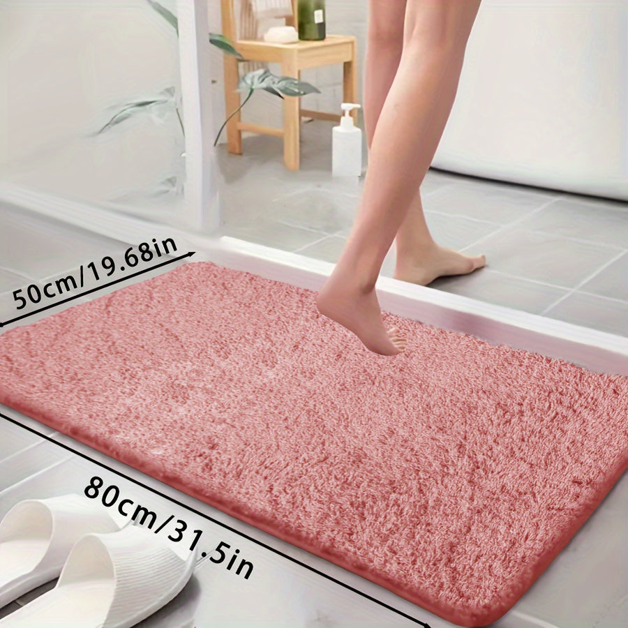 Ultra-soft bathtub mat with non-slip backing, absorbent and fade-resistant. Perfect for bathroom, laundry room, or entranceway.