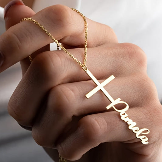 Personalize a name necklace pendant featuring a Middle Eastern style cross. Crafted with elegant stainless steel, this piece is perfect for everyday wear or music festivals. Share warm messages at parties or on vacation with this trendy and elegant