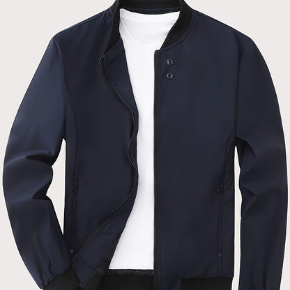 Solid color polyester jacket with zipper, stand collar, pockets, regular fit, and long sleeves. Suitable for all seasons with 100% polyester lining and 125g/m² fabric weight.