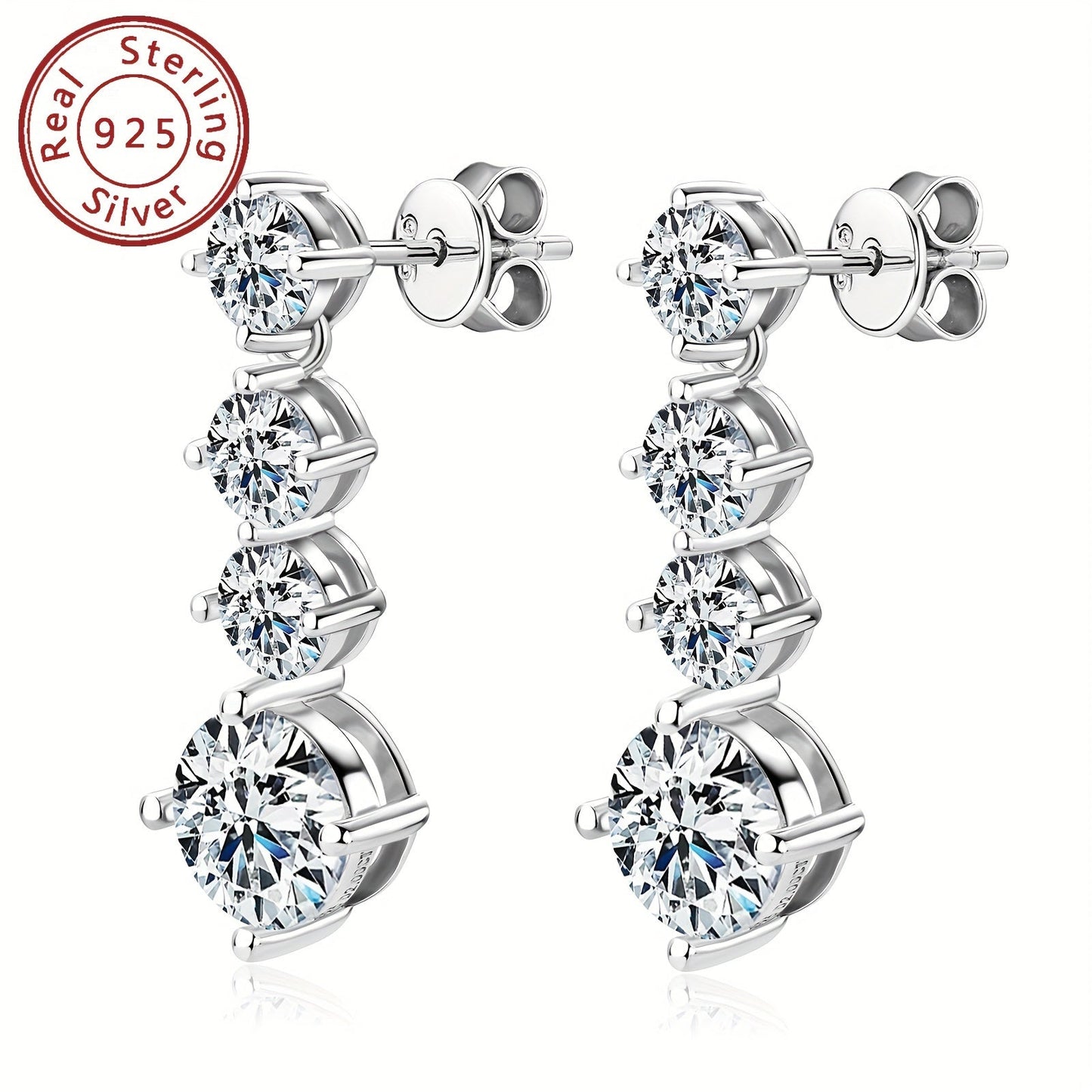 These elegant earrings feature a pair of 925 sterling silver earrings with a single 8mm round Mozambique stone pendant. The D color stones are perfect for any occasion, whether it be for an engagement, wedding, or birthday gift. The earrings weigh