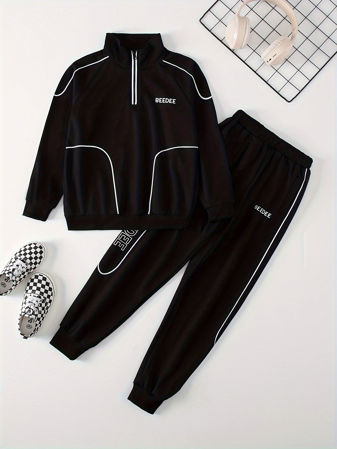 Boys' casual sportswear set includes zip-up jacket, joggers, and long sleeve shirt. Made of polyester, ideal for outdoor activities in spring and fall.