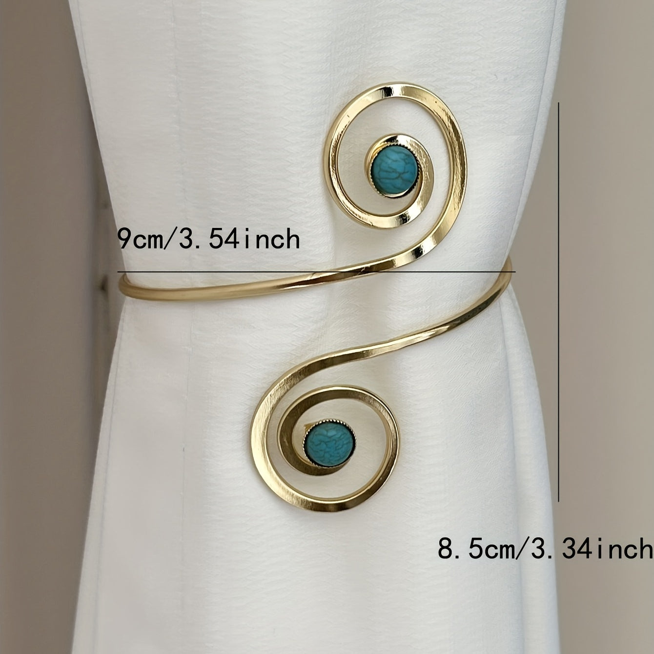 Modern minimalist metal curtain tieback for holding curtains in place, perfect for bedroom or living room decor.