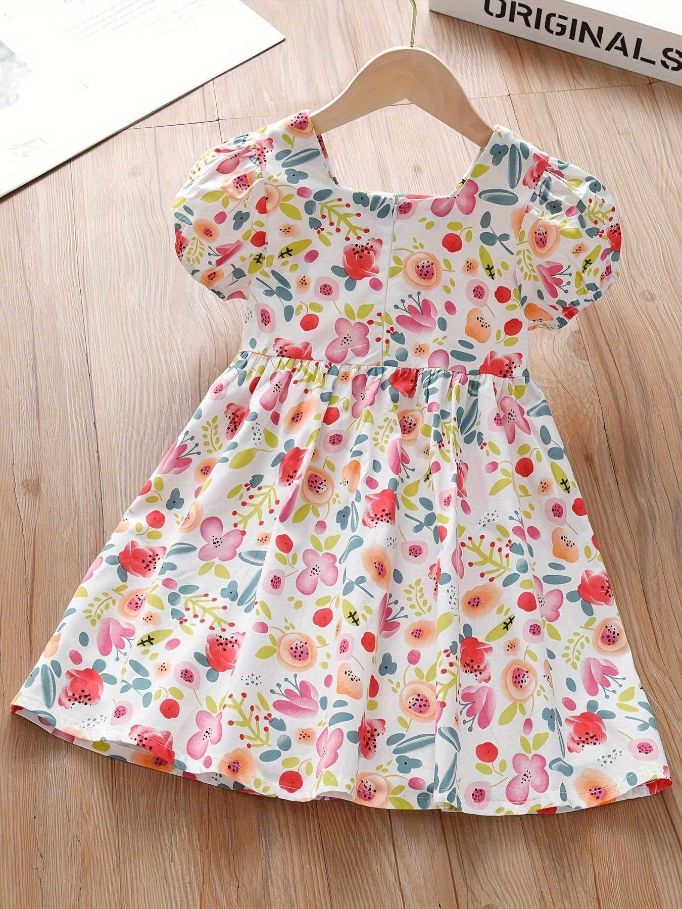 Summer dress with cute floral print and puff sleeves for girls