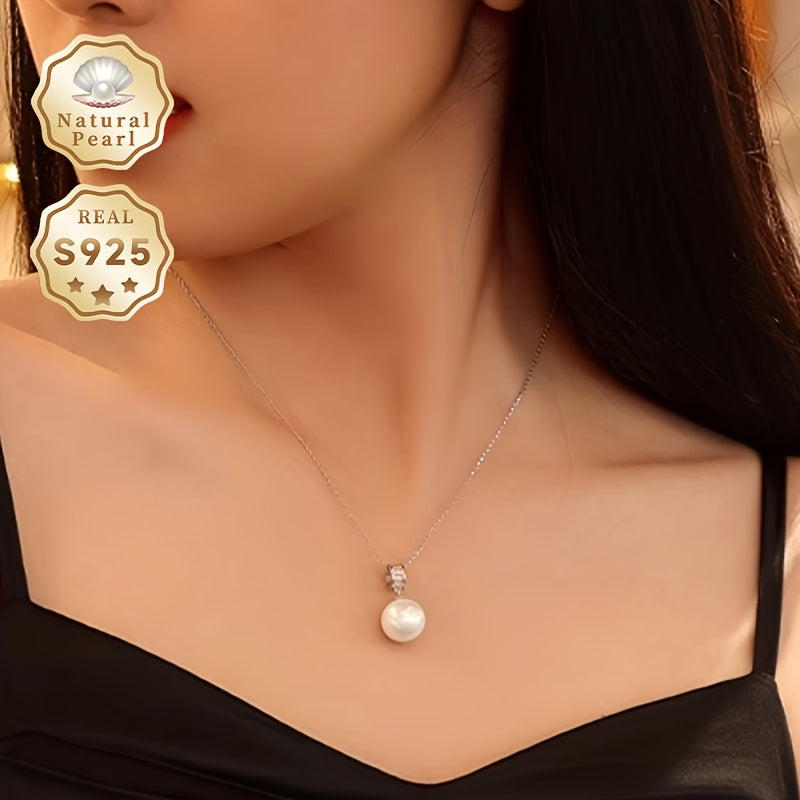 Surprise your loved one with this must-have gift - a stunning Pearl Necklace! This beautiful pendant necklace is made with S925 silver and features a 12-13mm round natural freshwater pearl. Each necklace is unique as natural pearls come in varying shapes