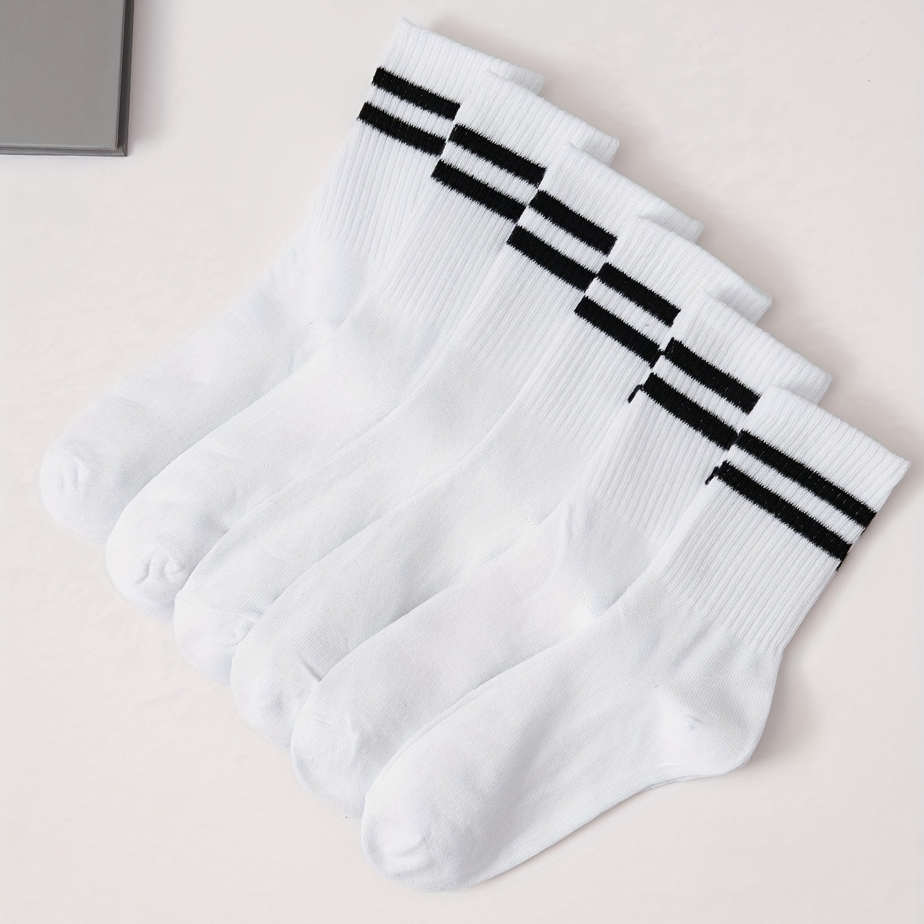 6 pairs of comfy striped print mid tube socks for women, perfect for sports and college style.