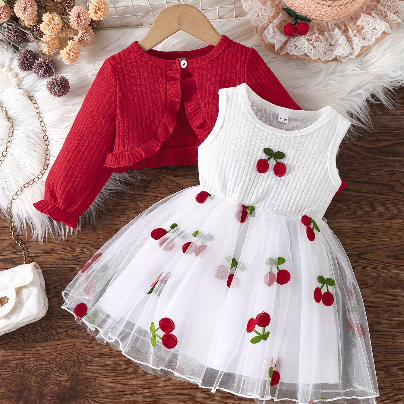 Girls' Set includes a long sleeve ruffle top with cherry embroidered mesh dress. Made of polyester knit fabric with a regular fit hooded placket. Cute fruit & vegetable pattern. Short