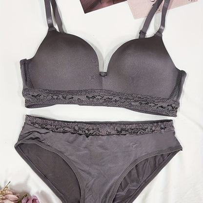 Simple yet elegant lace spliced bra and briefs set for women.