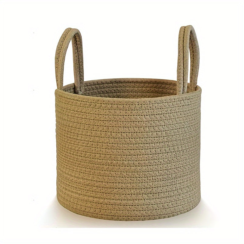 Large capacity rustic cotton rope woven laundry basket with a modern style, perfect for organizing clothes in your home. This round-shaped basket has handles for easy transportation and is ideal for use in the laundry room. No lining included.