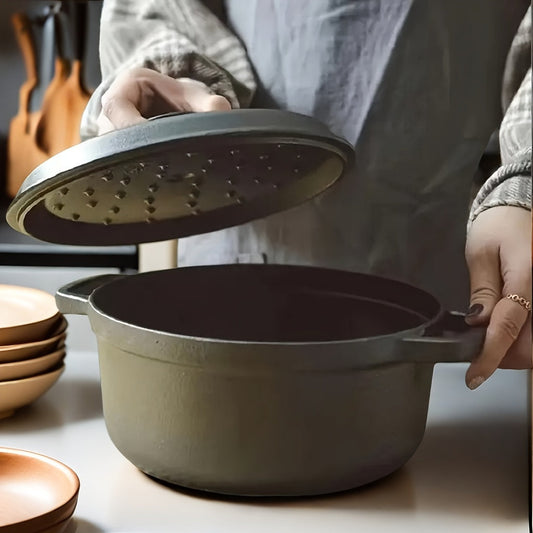 One piece of kitchenware - a double eared stew pot made of cast iron. This versatile pot, with a thickened flat bottom and no coating, is ideal for making soups and stews. It is non-stick and can be used for various purposes in the kitchen. A must-have