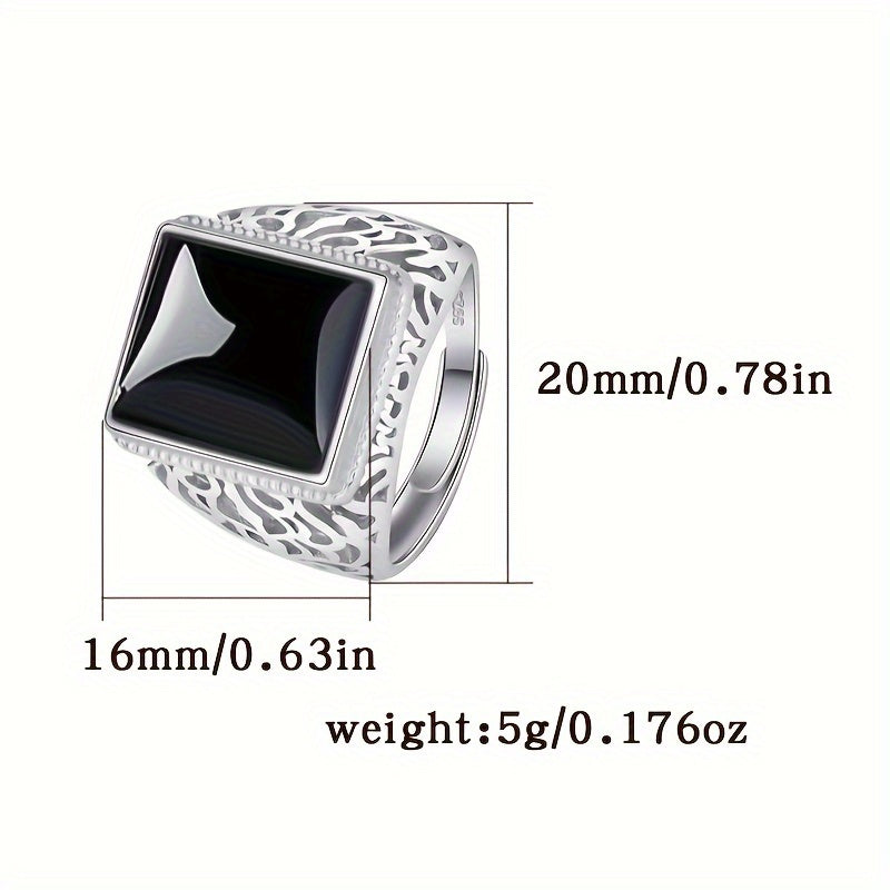 This bold and stylish open ring features a domineering and generous design, with a striking black onyx and hollow imitation jade pattern. Made from 5g of high-quality 925 silver, this ring is suitable for daily wear or for special occasions such as