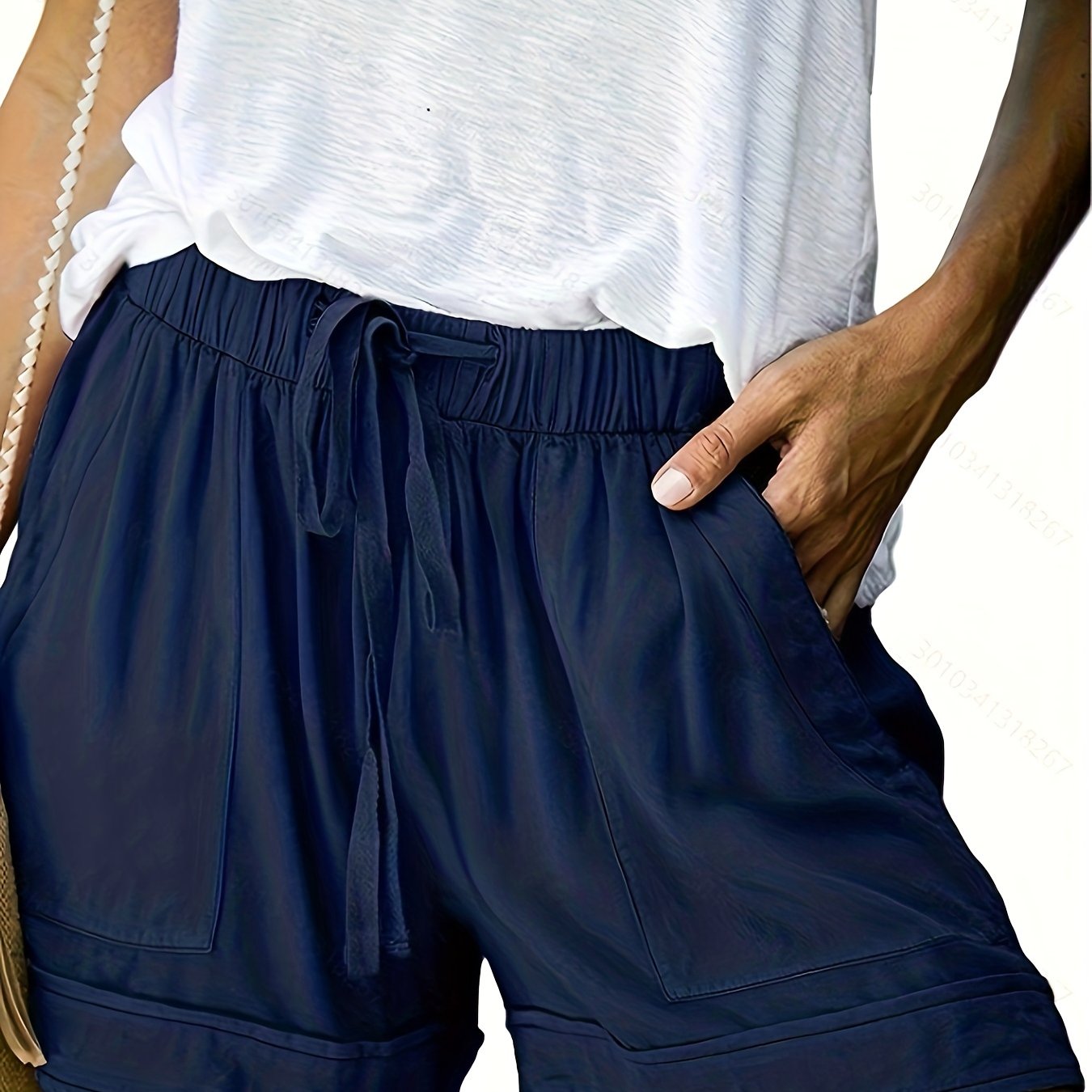 Polyester shorts for women with drawstring elastic waist, comfortable for summer. Made of 100% woven fabric.