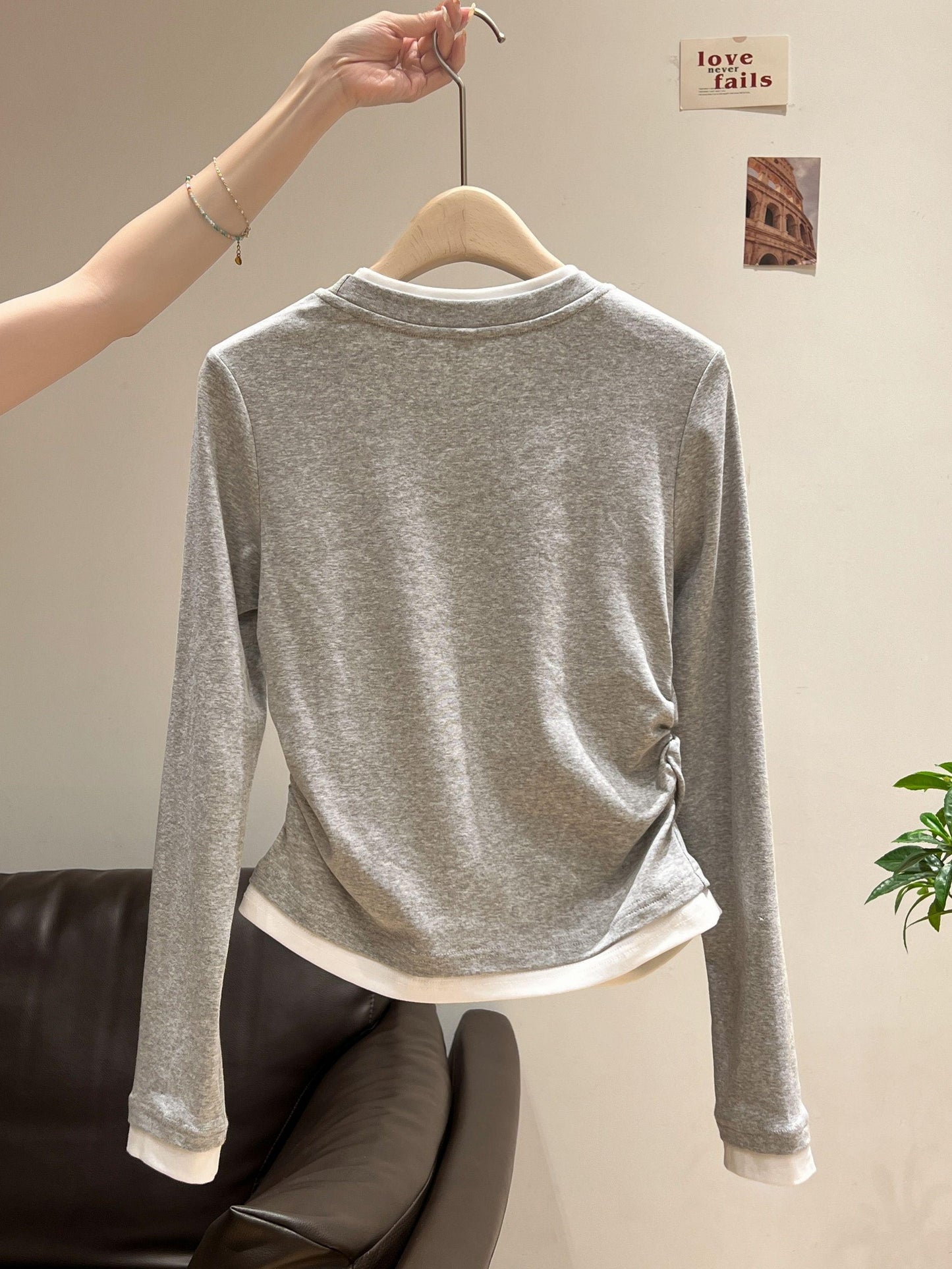 Women's slim fit knit T-shirt with ruched detail and contrast collar, suitable for all seasons.