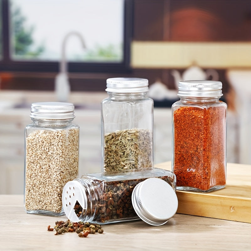 Complete your kitchen with our 24-piece Glass Spice Jar Set, featuring Aluminum Lids. Each 4oz Square Container is perfect for storing seasonings, salt, pepper, and more. Includes Labels, Collapsible Funnel, and Brush to keep your spices organized and