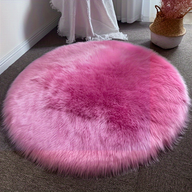 Round luxury area rug made from soft faux fur material with high pile and knit weave, machine washable, lightweight and fluffy. Crafted from a blend of polyester and acrylic in a solid color design. Perfect for adding a cozy touch to bedroom, living