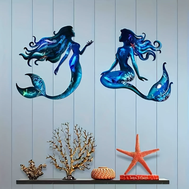 Ocean-themed metal mermaid wall art for indoor or outdoor nautical decor.