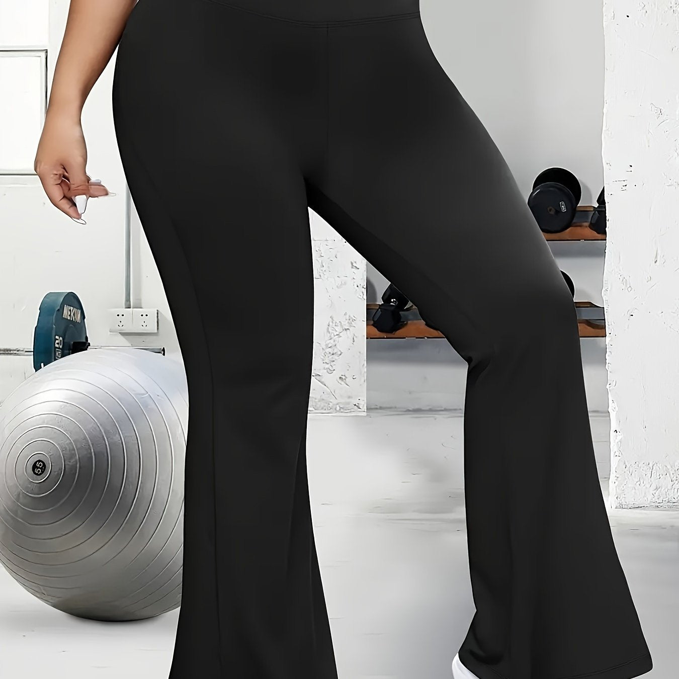 Solid flare leg pants for plus size women, suitable for spring and summer.