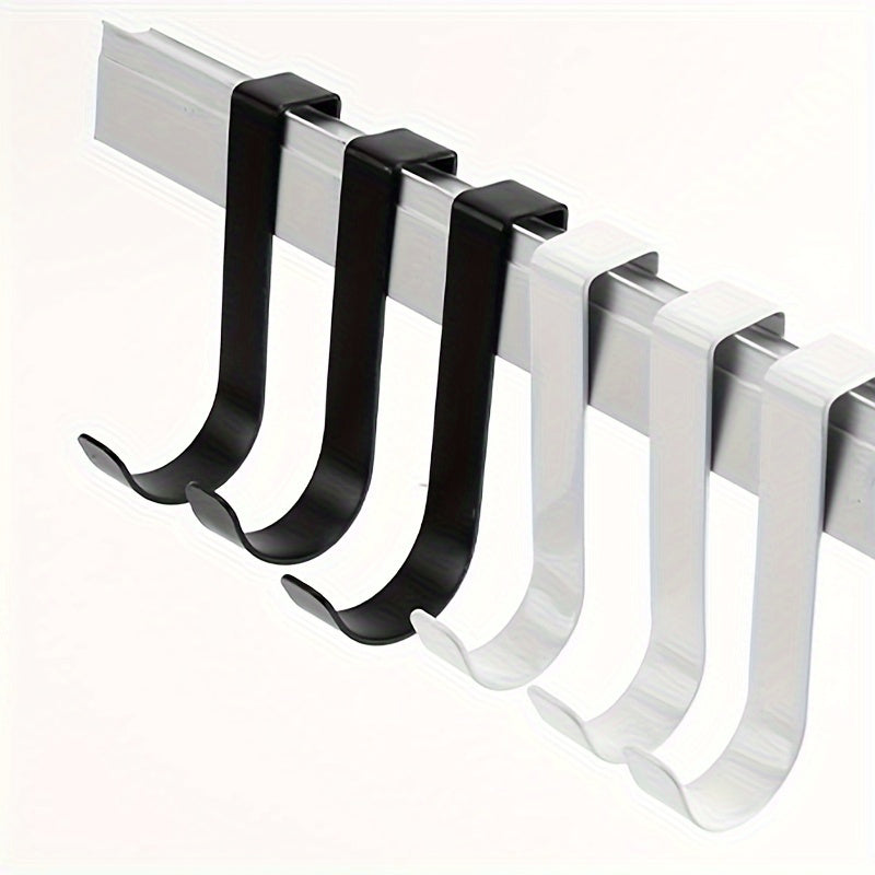 2 sleek black & white J-shaped hooks for easy installation, ideal for hanging towels, bags, and decorations in bathroom, kitchen, and cabinets.